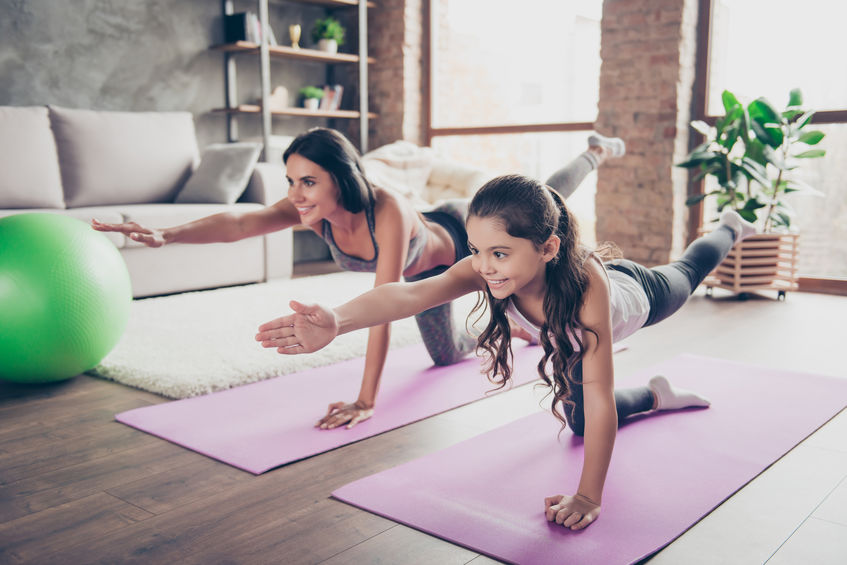 3 benefits of using Pinterest for your fitness brand, people doing yoga at home