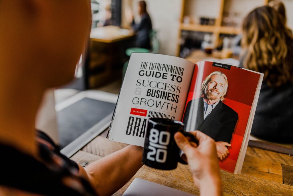 An entrepreneur reading about business growth.