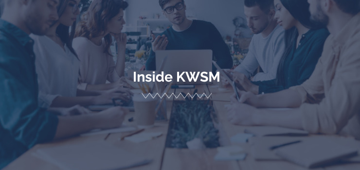 A person effectively leading a team, which the KWSM Leadership Program prepared us to do.