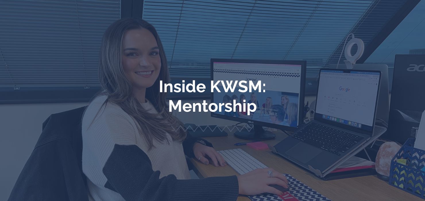 Girl sitting at desk writing blog about the KWSM Mentorship Program, which focused on learning agency operations.